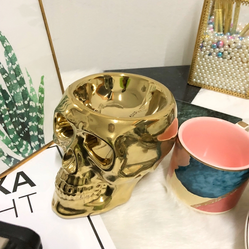 gold skull tealight candle holder